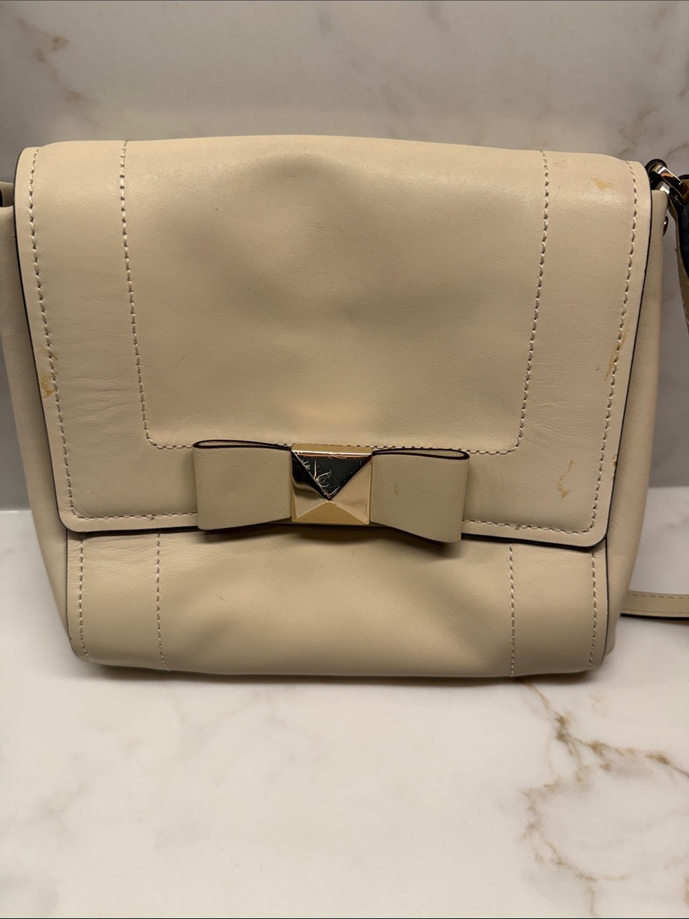 Cream Bow-Front Crossbody Bag with Gold Accent